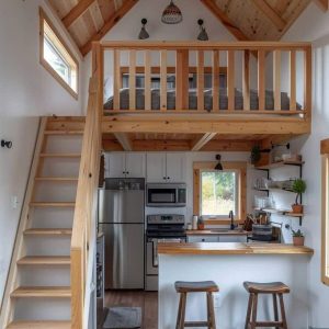 Mẫu nhà nhỏ có gác lửng kiểu cabin gỗ – Không gian sống ấm cúng giữa lòng thiên nhiên